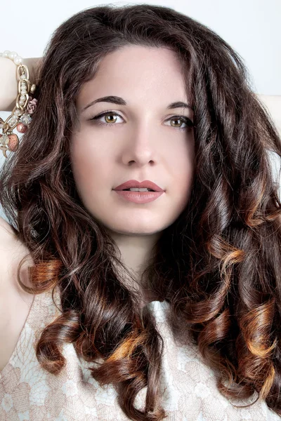 Beautiful young woman with long brown hair. — Stock Photo, Image