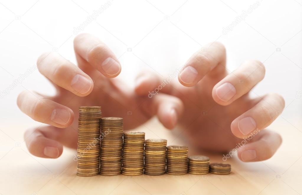 Greed for money. Hands grabbing coins.