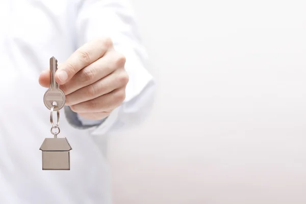 House key in hand — Stock Photo, Image