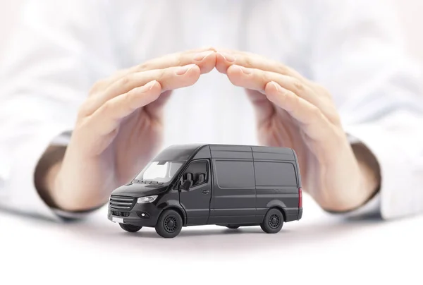 Transport black van car protected by hands