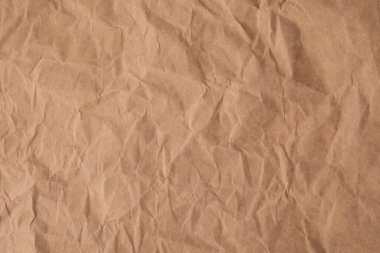 Buruşmuş geri dönüştürülmüş kahverengi kağıt doku arkaplanı