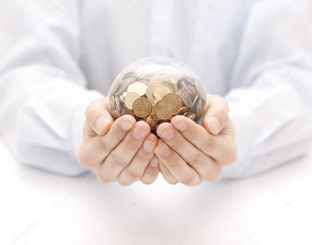 Crystal ball with money in hands