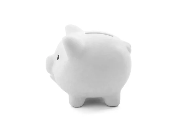 Fehér piggy bank a Vágógörbe — Stock Fotó