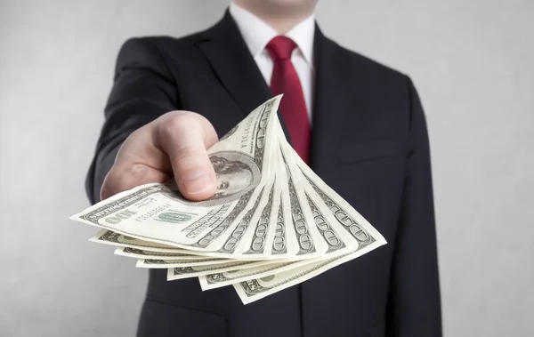 Businessman with american dollars. Clipping path included. — Stock Photo, Image