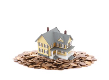 Sikke yığını küçük oyuncak ev