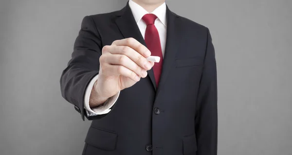 Empresario escribiendo con tiza. Puede agregar su propio texto . — Foto de Stock