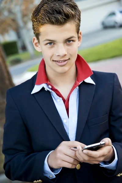 Handsome teen with phone — Stock Photo, Image