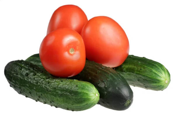 Cucumbers and tomatoes on a white background — Stock Photo, Image