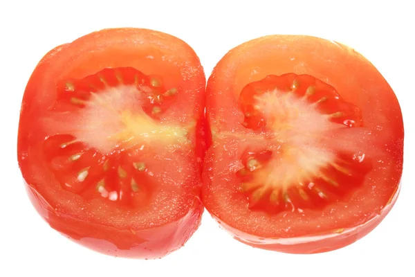 El tomate cortado sobre un fondo blanco — Foto de Stock