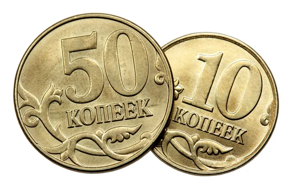 Duas moedas em um fundo branco — Fotografia de Stock