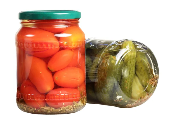 Canned tomatoes and cucumbers on a white background — Stock Photo, Image