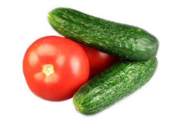 Tomatoes and cucumbers — Stock Photo, Image