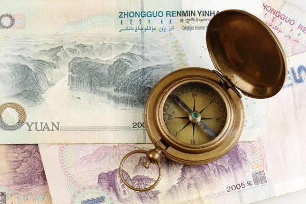 Компас і юанях — стокове фото