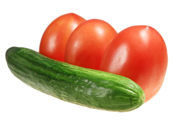 Pepino y tres tomates Imagen De Stock