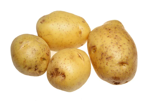 Batatas em um fundo branco — Fotografia de Stock