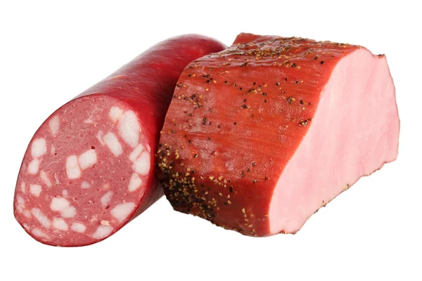 Carne e salsicha em um fundo branco — Fotografia de Stock