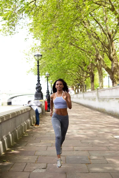 Fitness woman going for a run — Stock Photo, Image
