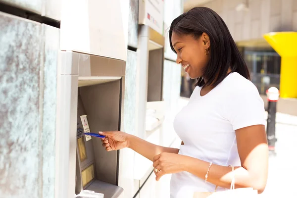Young woman at the cash machine — Stock Photo, Image