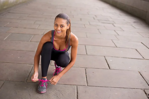 Fitness woman exercising in london — Stock Photo, Image