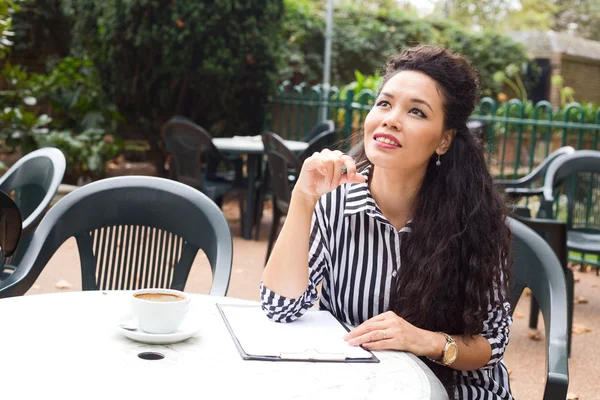 Woman at coffee shop — Stock Photo, Image