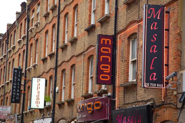 Brick lane restaurant tekenen — Stockfoto