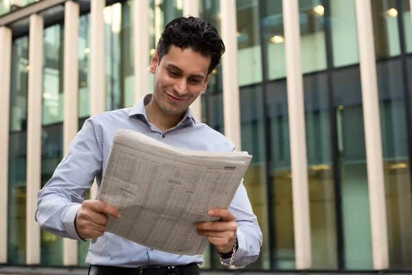 Business man reading newspaper — Stock Photo, Image