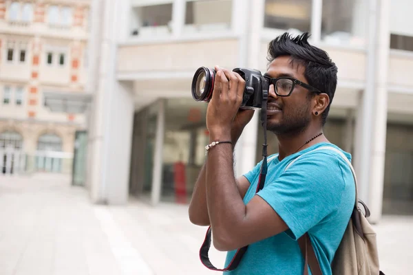 A young photographer — Stock Photo, Image