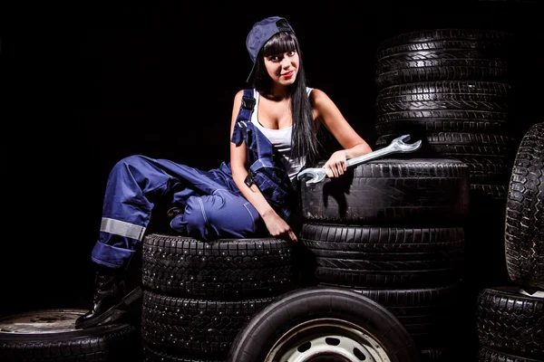 Woman in a tire service