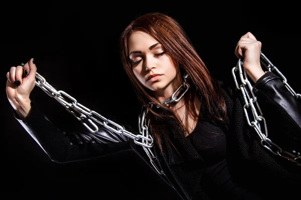 Beautiful young woman with chains