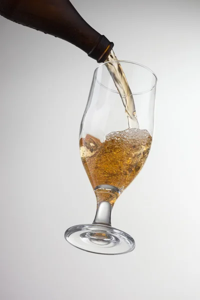 Beer pouring into glass — Stock Photo, Image