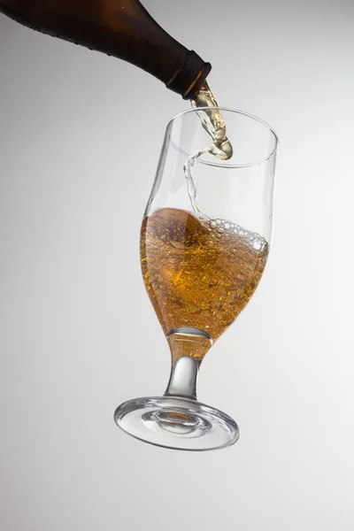 Beer pouring into glass — Stock Photo, Image