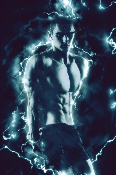 Fitness homme sur noir avec le feu — Photo