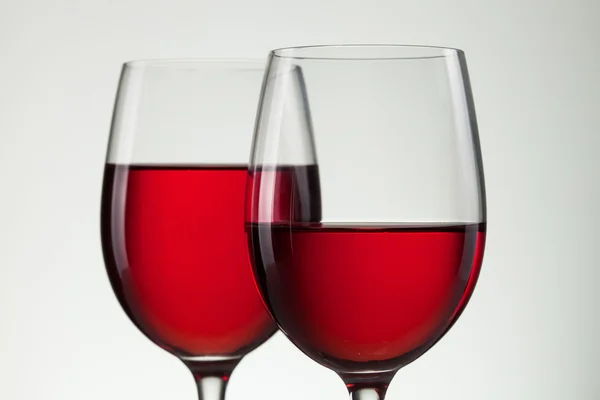 Wine in glass and bottle of wine on white — Stock Photo, Image