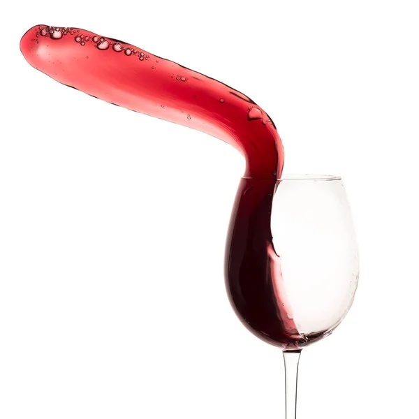 Červené Víno Cákající Sklenice Izolované Bílém — Stock fotografie