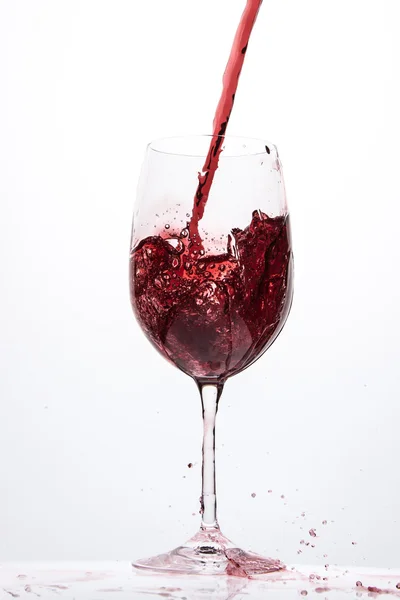 Pouring red wine — Stock Photo, Image