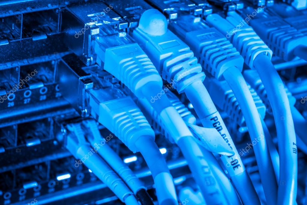 Network hub and patch cables Stock Photo by ©kubais 98329074