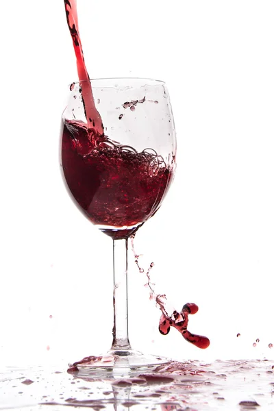 Pouring red wine — Stock Photo, Image