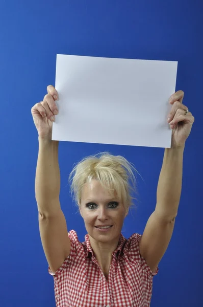 Woman holding blank sign — Stock Photo, Image