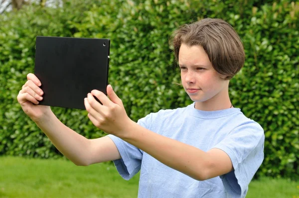 Girl using digital tablet — Stock Photo, Image