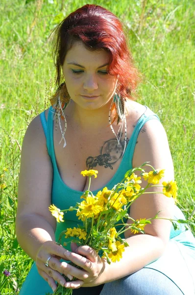 Woman in a meadow — Stock Photo, Image