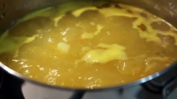 Boiling in a pot of pumpkin soup — Stock Video