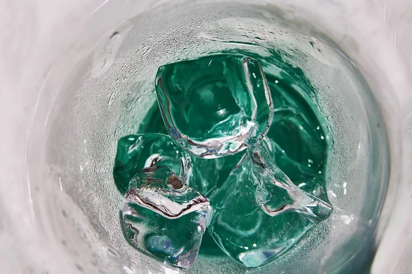 Glass with transparent ice — Stock Photo, Image