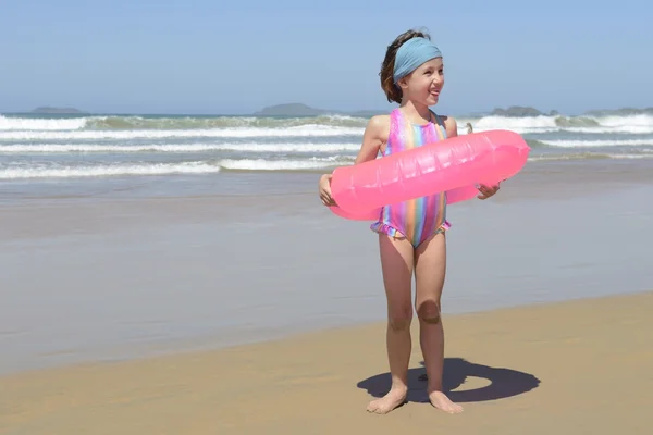 Child with inflatable swimming ring — Stock Photo, Image