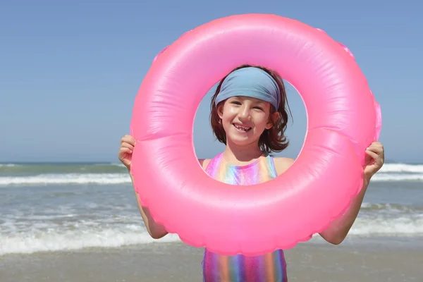 Child with inflatable swimming ring — Stock Photo, Image