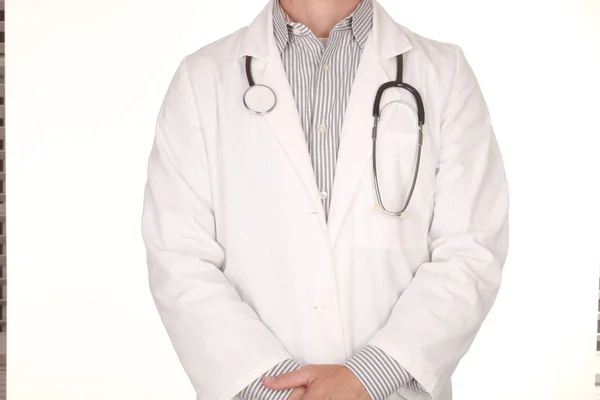 Male Doctor Wearing Stethoscope on White Background — Stock Photo, Image