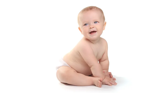 Bebê adorável feliz em um fundo branco — Fotografia de Stock