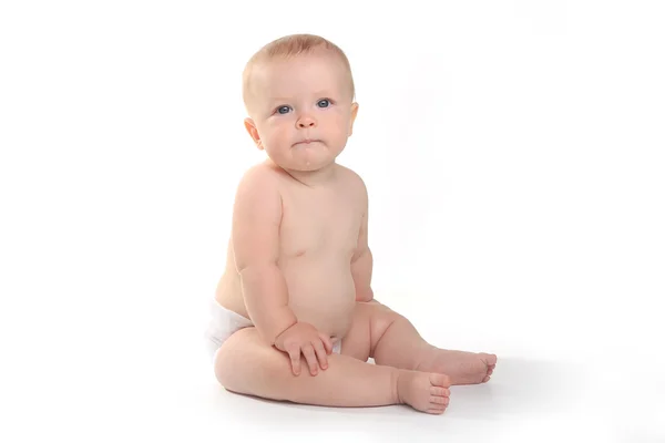 Bebê adorável feliz em um fundo branco — Fotografia de Stock