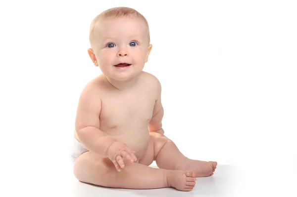 Bebê adorável feliz em um fundo branco — Fotografia de Stock