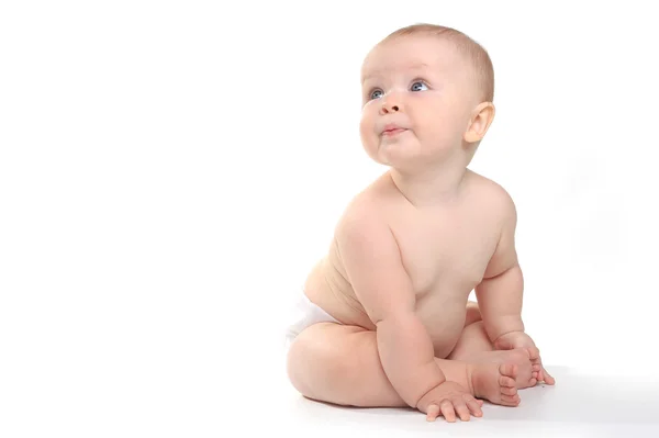 Bebê adorável feliz em um fundo branco — Fotografia de Stock