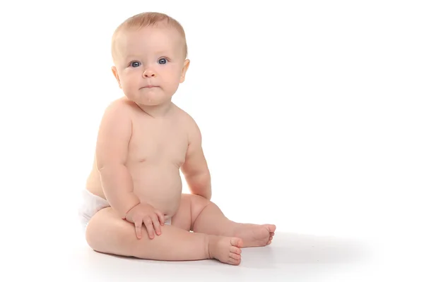 Bebê adorável feliz em um fundo branco — Fotografia de Stock